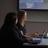 TRC Employees In Conference Meeting